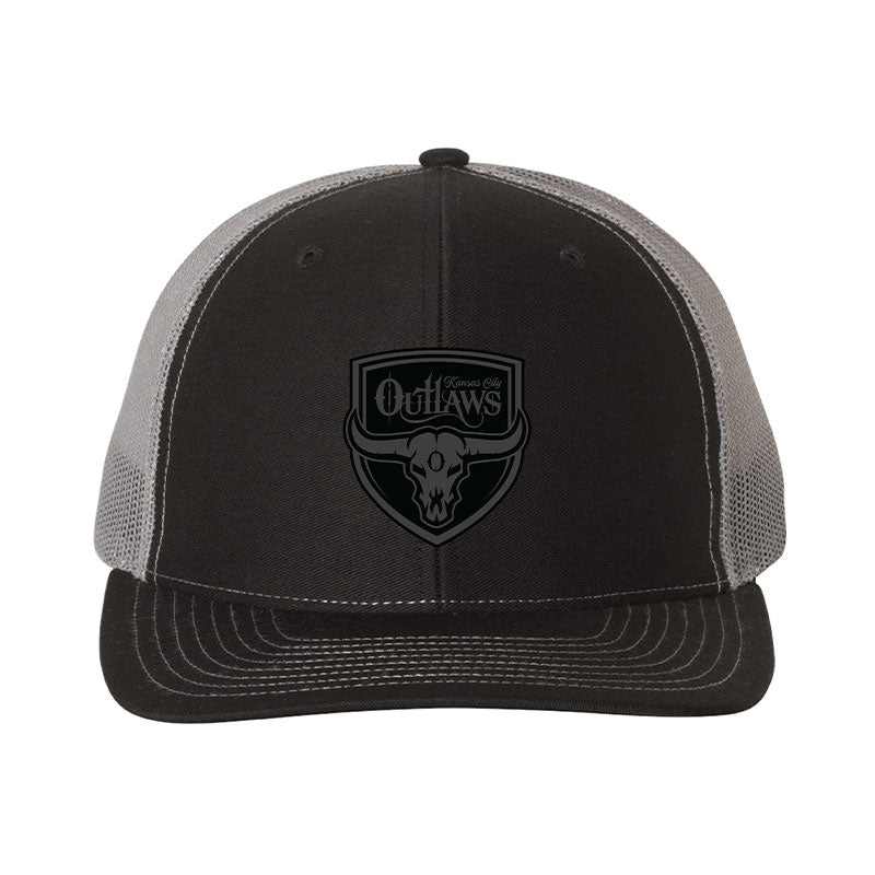 Black and gray trucker hat with 'Outlaws' logo