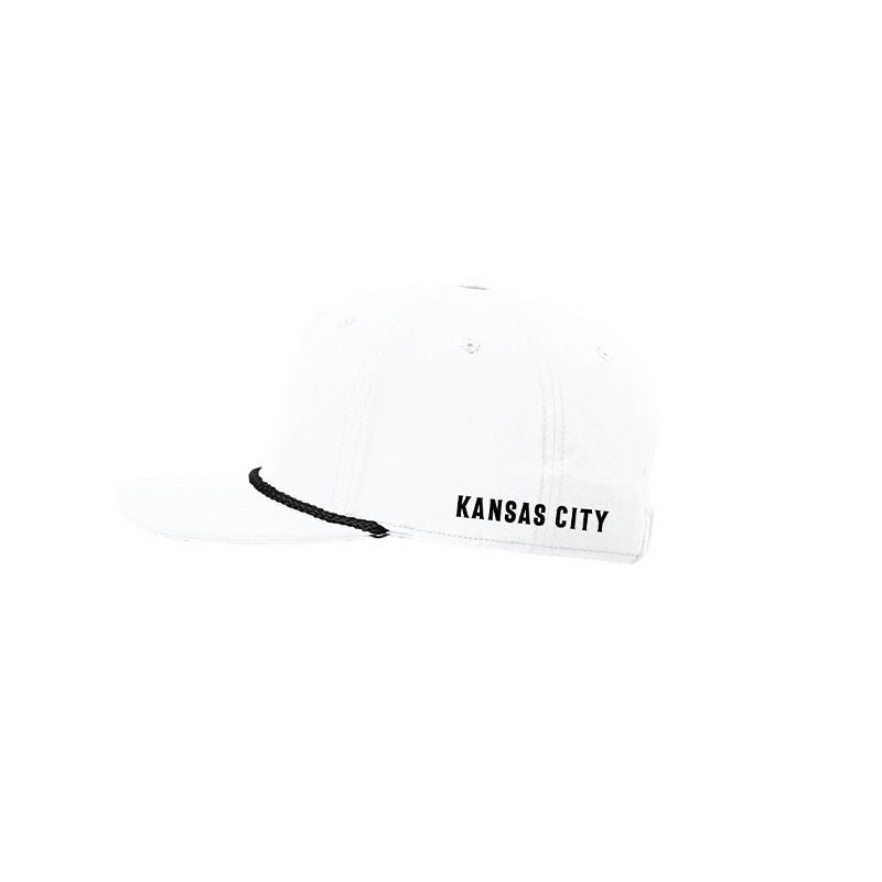 Side of a white cap with 'Kansas City' text on a white background